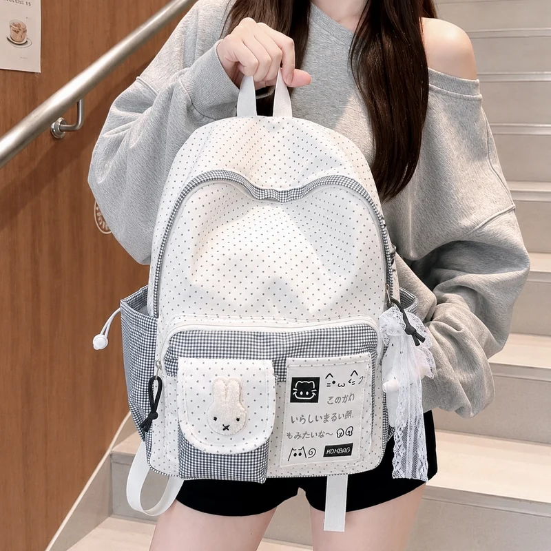 Verspielt gepunkteter Rucksack Karnz