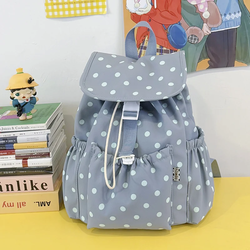 Verspielter gepunkteter Rucksack mit Kordelzug Karnz