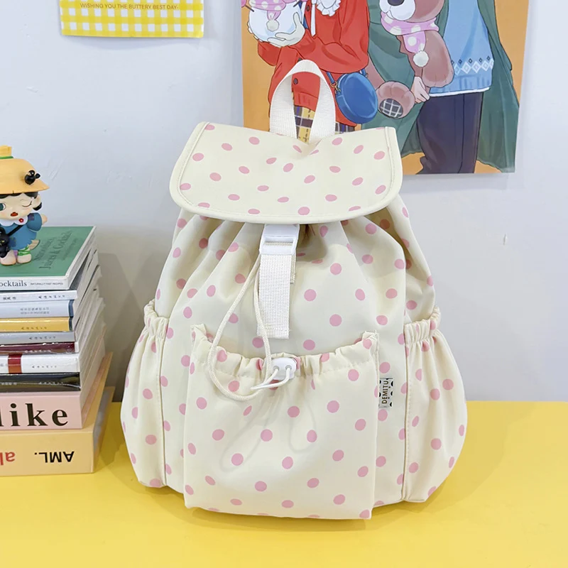 Verspielter gepunkteter Rucksack mit Kordelzug Karnz