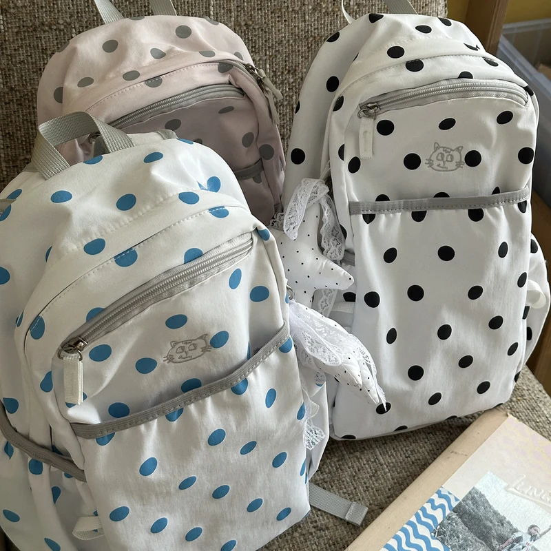 Verspielter gepunkteter Rucksack Karnz