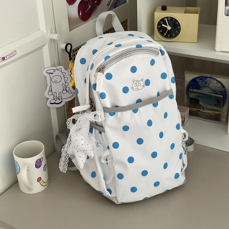 Verspielter gepunkteter Rucksack Karnz