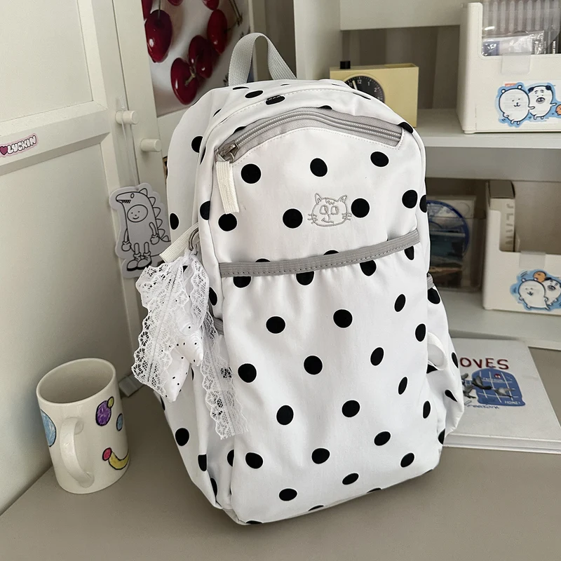 Verspielter gepunkteter Rucksack Karnz