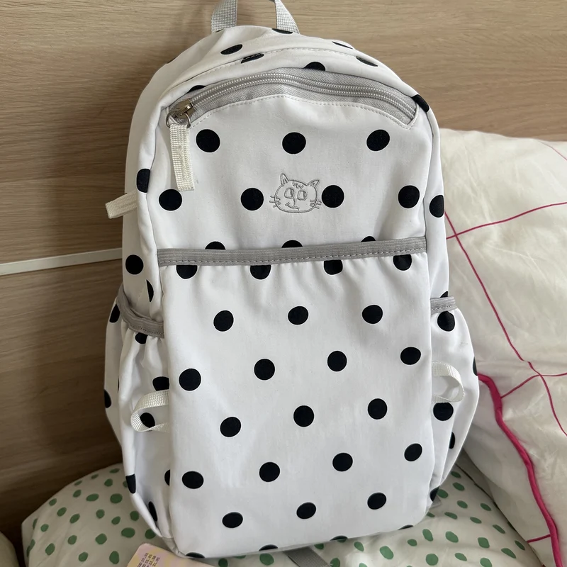 Verspielter gepunkteter Rucksack Karnz