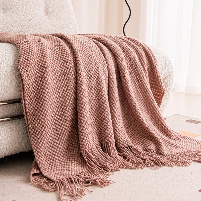Strukturierte Strickwurfdecke
