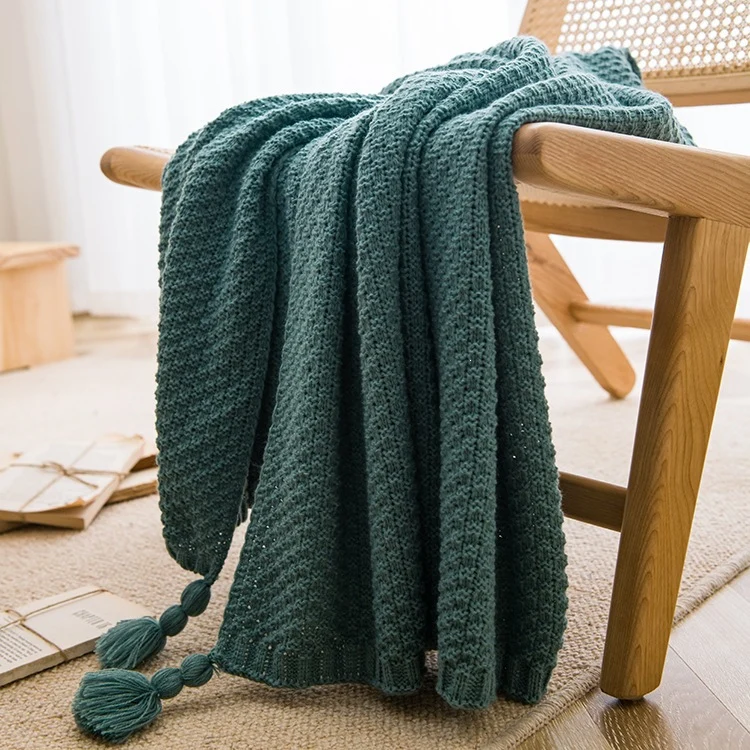 Strukturierte Strickwurfdecke
