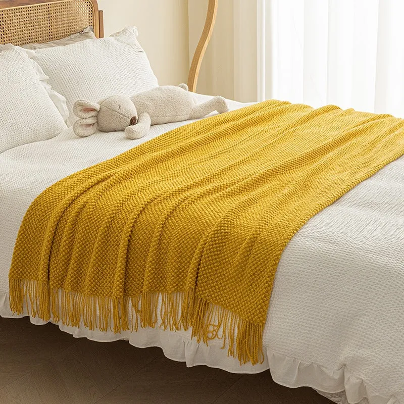Strukturierte Strickwurfdecke