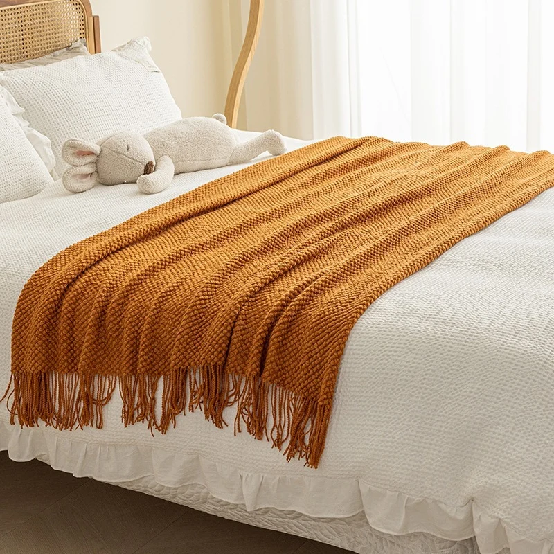 Strukturierte Strickwurfdecke