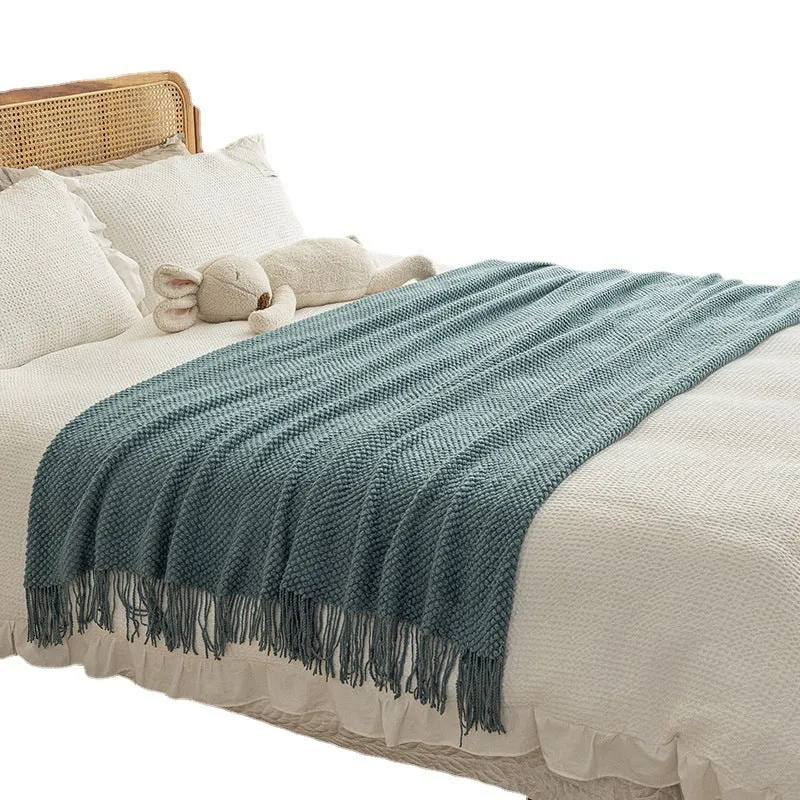 Strukturierte Strickwurfdecke