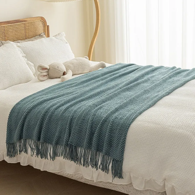 Strukturierte Strickwurfdecke