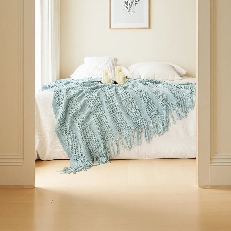 Gemütliche Strickwurfdecke