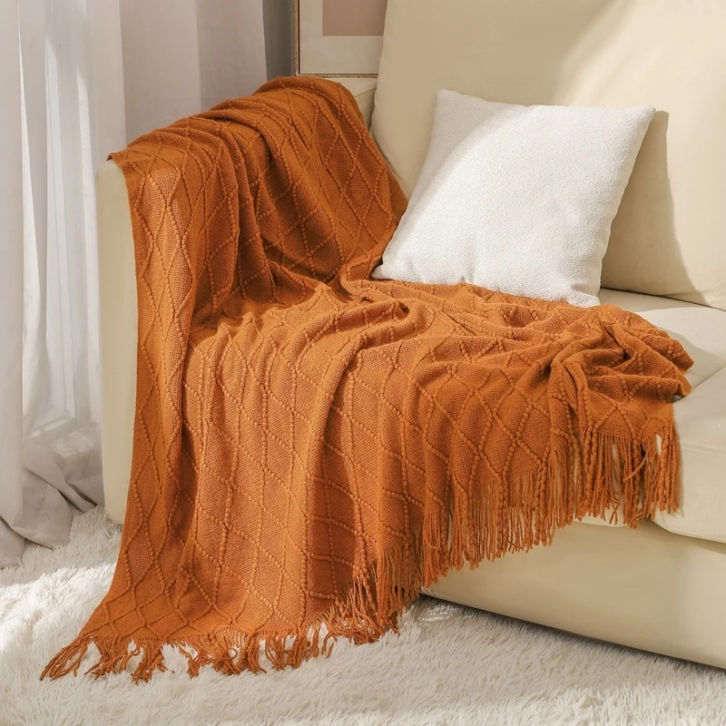 Gemütliche strukturierte gestrickte Wurfdecke