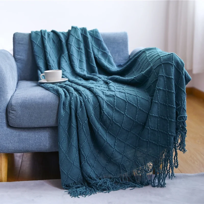 Gemütliche strukturierte gestrickte Wurfdecke