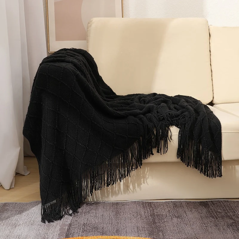 Gemütliche strukturierte gestrickte Wurfdecke
