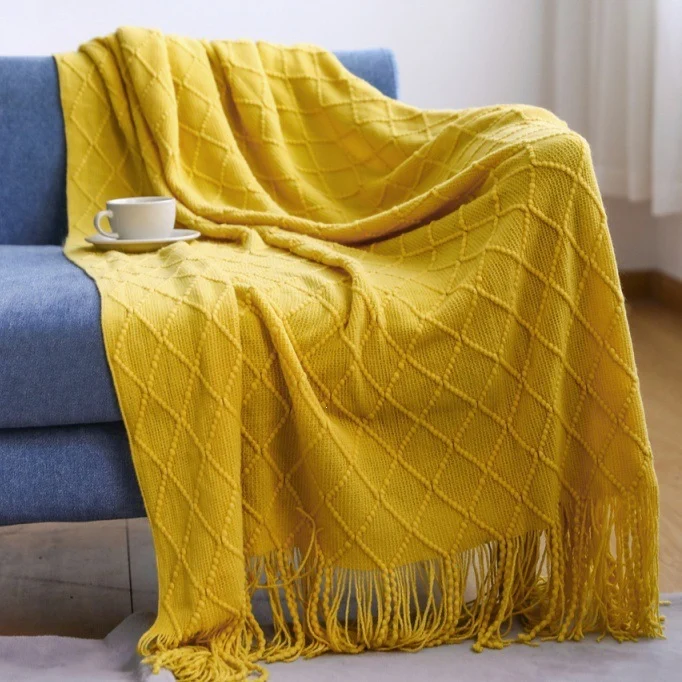 Gemütliche strukturierte gestrickte Wurfdecke