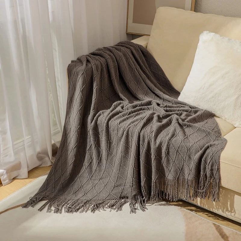 Gemütliche strukturierte gestrickte Wurfdecke