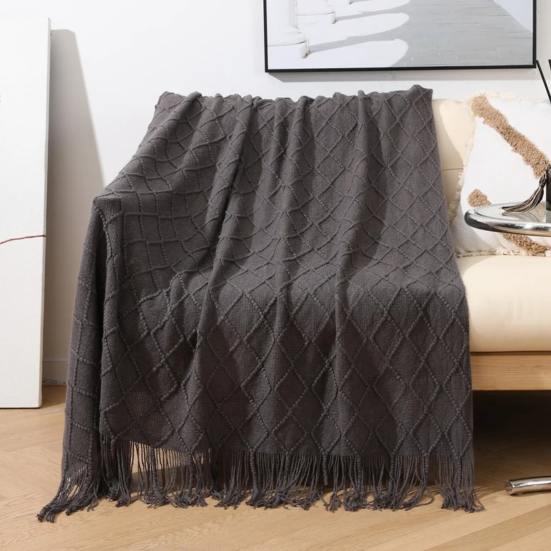 Gemütliche strukturierte gestrickte Wurfdecke