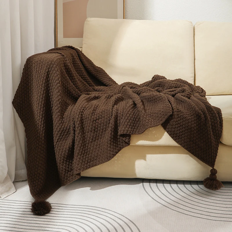 Strukturierte Strickwurfdecke
