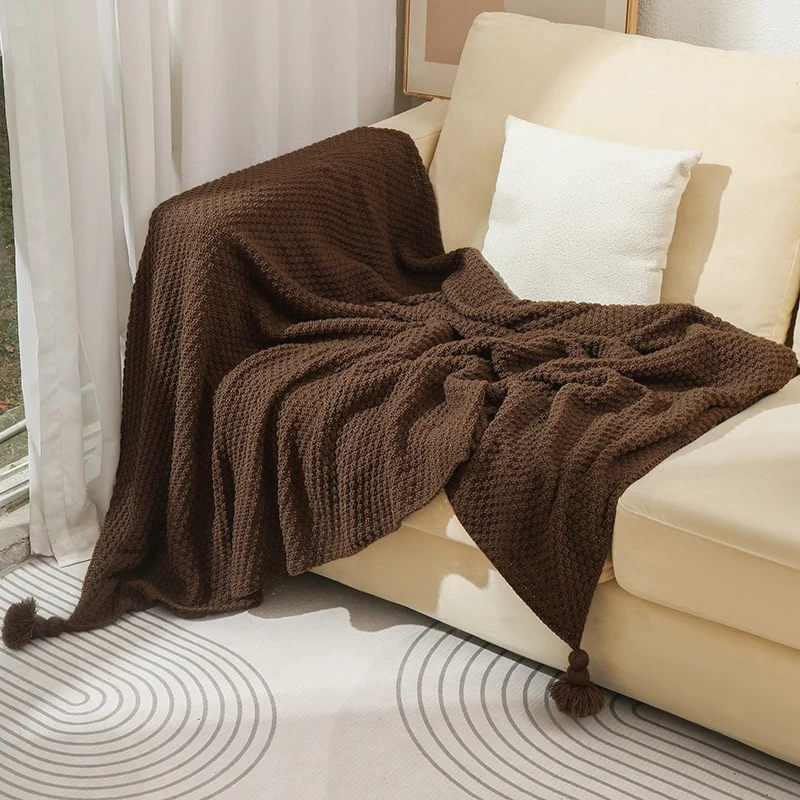 Strukturierte Strickwurfdecke