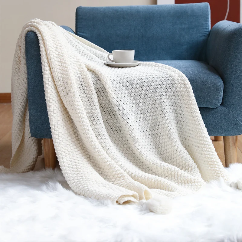 Strukturierte Strickwurfdecke