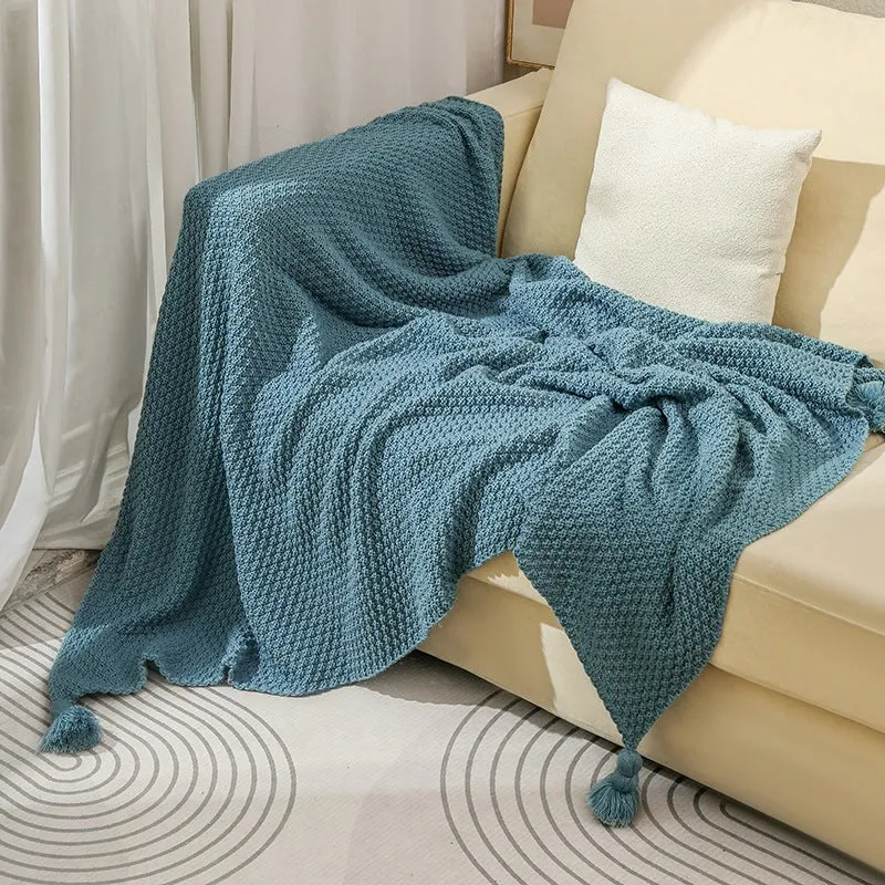 Strukturierte Strickwurfdecke