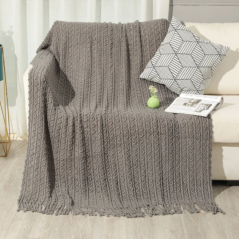 Strukturierte Strickwurfdecke