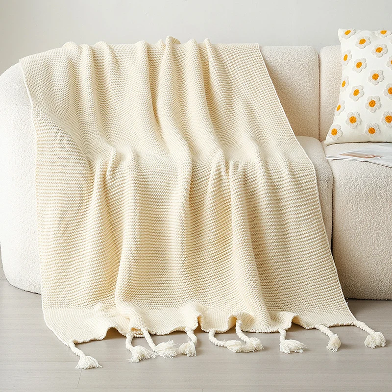 Strukturierte Strickwurfdecke