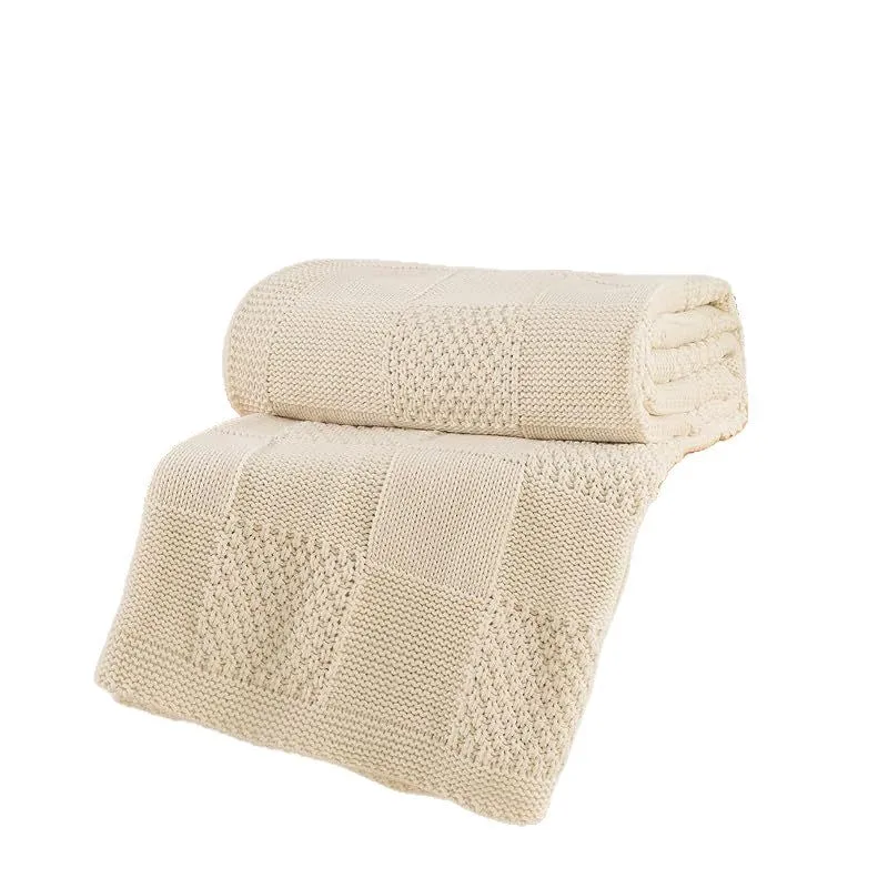Strukturierte Strickwurfdecke