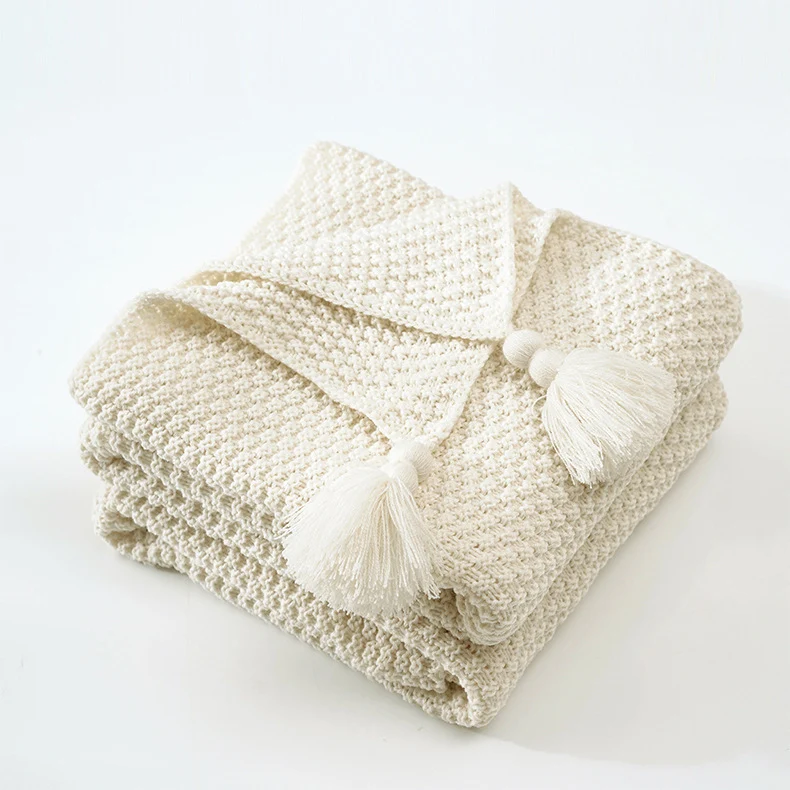 Strukturierte Strickwurfdecke