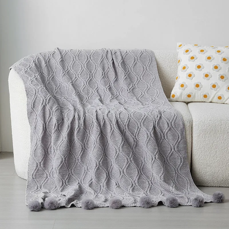 Dekorativer gestrickter Wurfdecke
