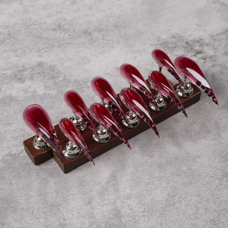 Künstlerische Stiletto Press-On Nägel mit glänzendem Finish