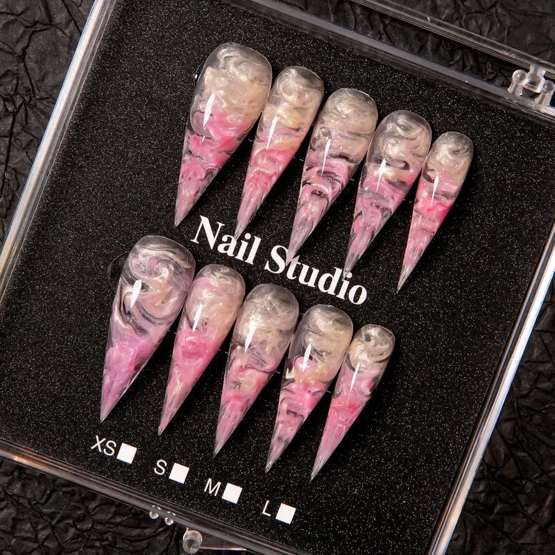 Künstlerisches Stiletto Press-On Nagelset mit Marmor-Finish
