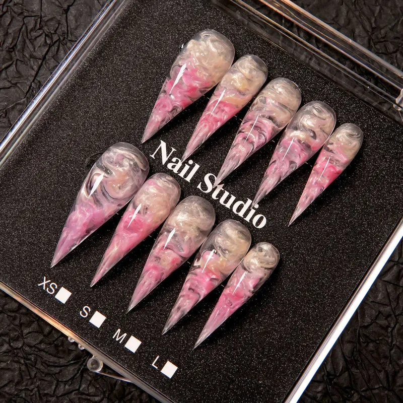 Künstlerisches Stiletto Press-On Nagelset mit Marmor-Finish