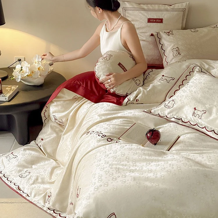 Seidenglänzendes Satin-Bettwäscheset mit zweifarbiger Wendefunktion und Tierstickerei