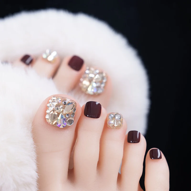 Rhinestone-besetzte dekorative Zehennägel
