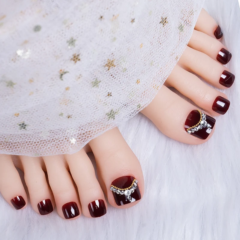 Glitzernde French Tip Zehennagelkunst