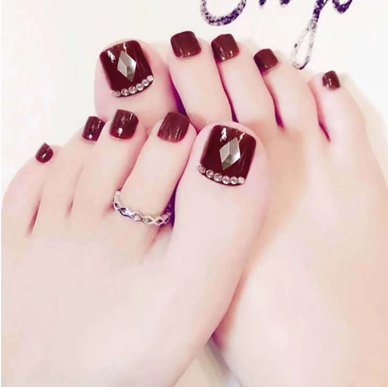 Glitzernde French Tip Zehennagelkunst