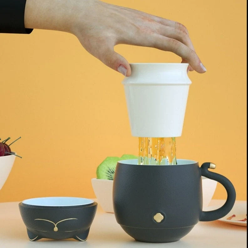 Skanto | Süße Katzen-Tasse aus Keramik mit Sieb