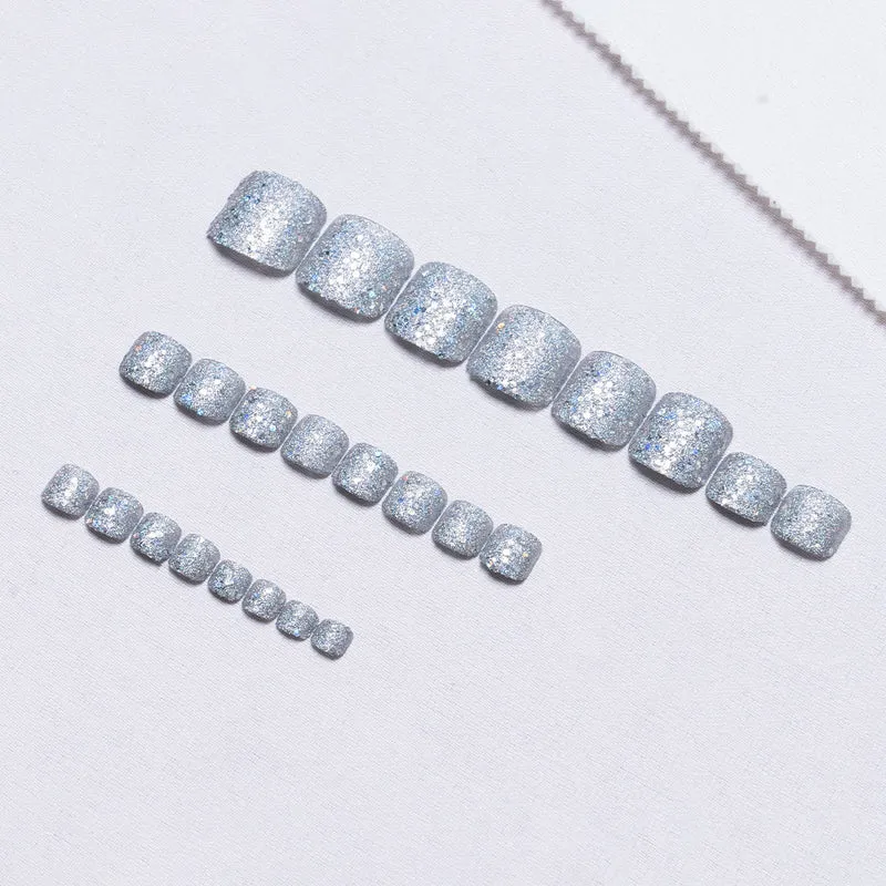Glitzernde Nagelkunst Pediküre