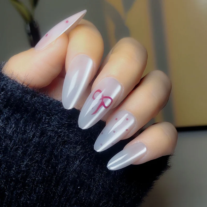 Elegante Stiletto Press-On-Nail-Art mit minimalistischen Schleifen-Design