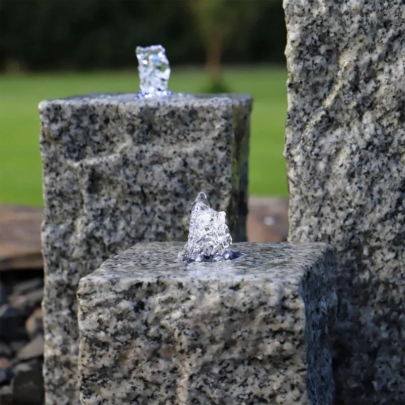 Granit Springbrunnen LED Gartenbrunnen Naturstein