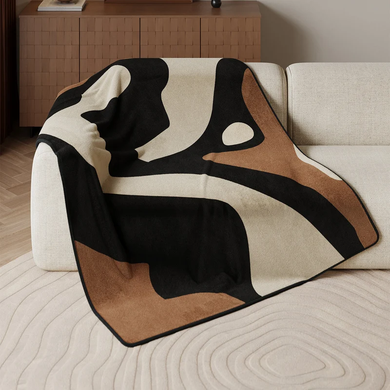 Moderne geometrische Fleece-Wurfdecke
