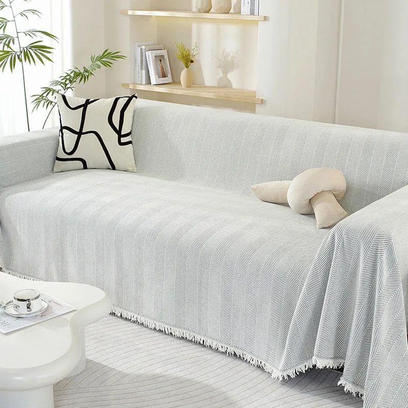 Skanto | Chenille-Überwurf mit Fischgrätmuster und Quasten für Sofas
