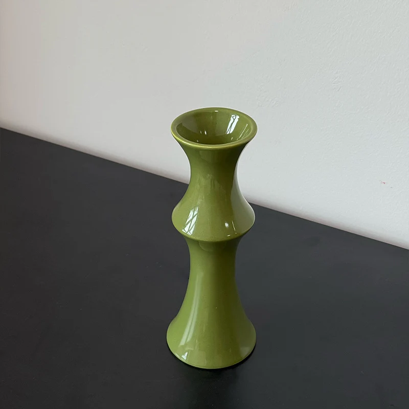 Glänzende skulpturale Sanduhrkeramikknopf mit ausgestelltem Rand