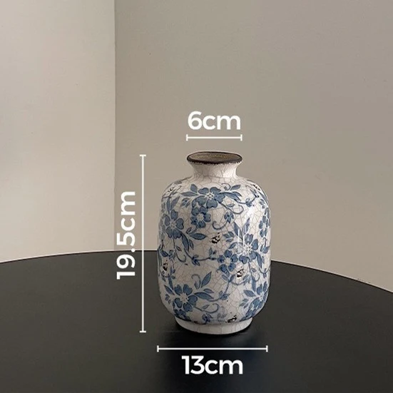 Rissige glasierte Keramik-Vase mit floralem Muster, schmalem Hals und zylindrischem Körper