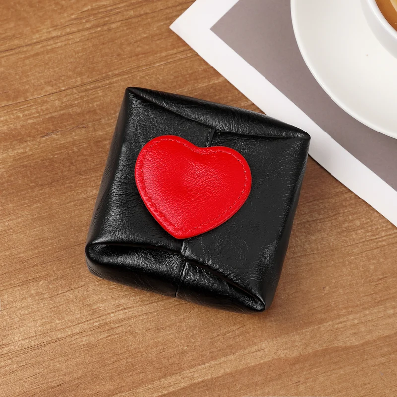 Herz-verzierte Leder-Münztasche