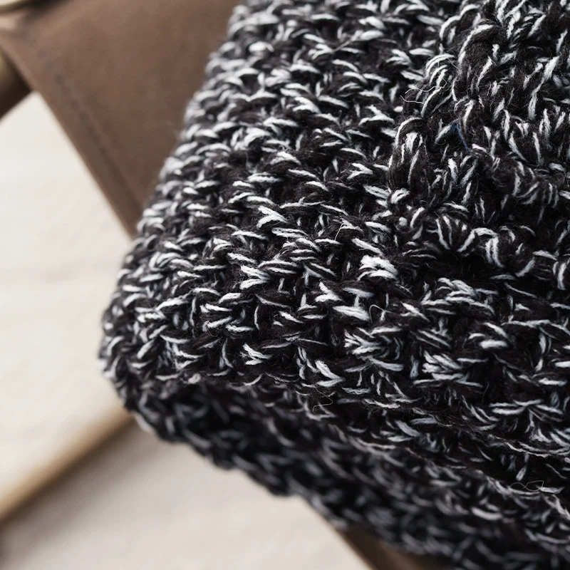 Gemütliche Strickwurfdecke