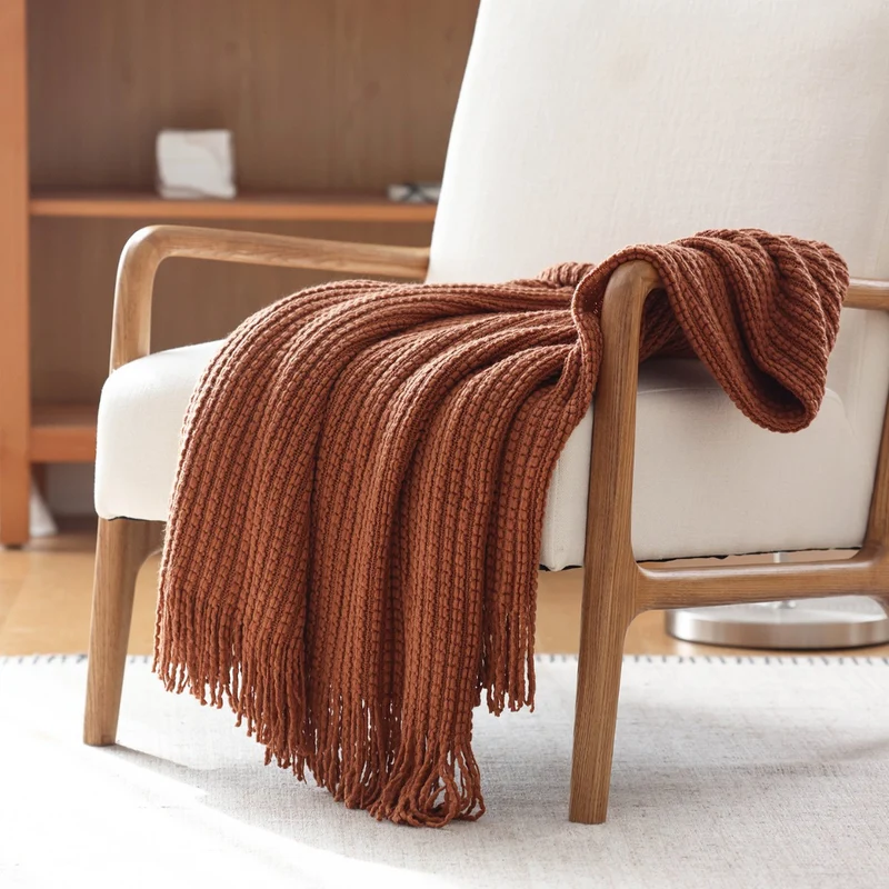 Gemütliche Strickwurfdecke