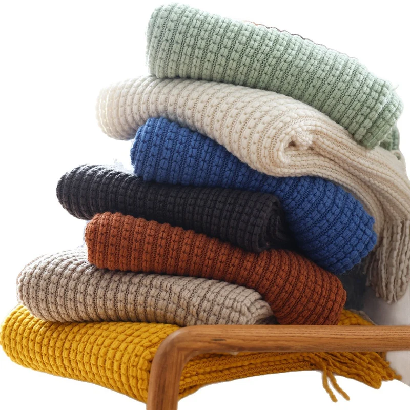 Gemütliche Strickwurfdecke