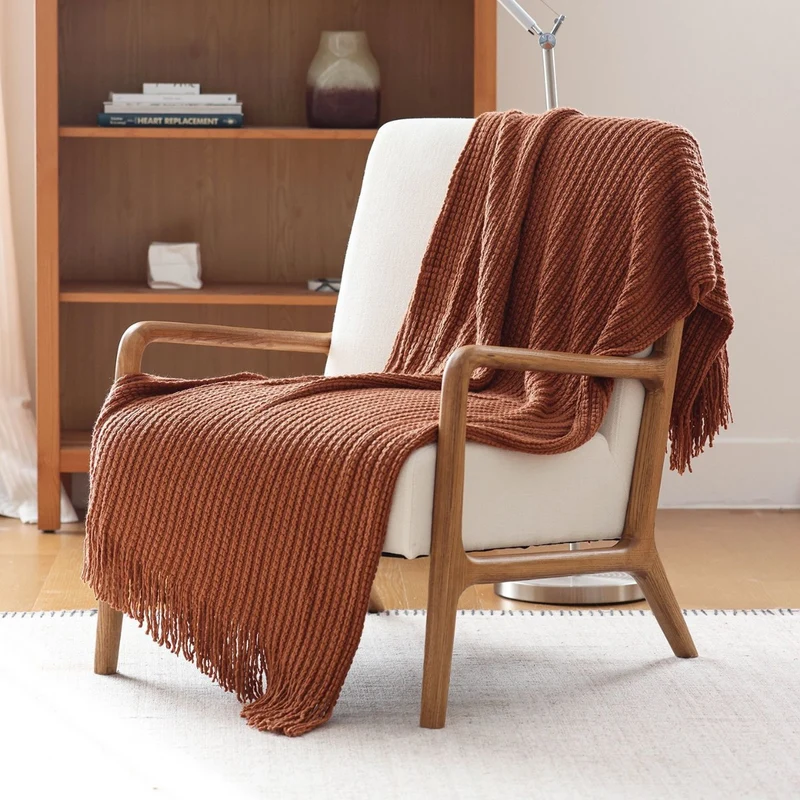 Gemütliche Strickwurfdecke