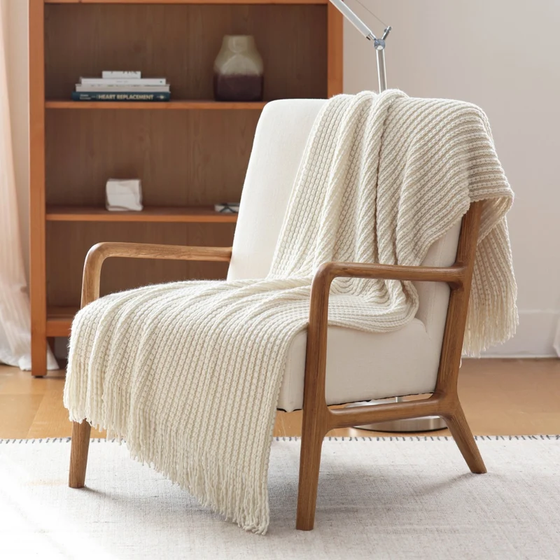 Gemütliche Strickwurfdecke